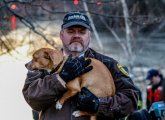 Boston EMT with rescued dog