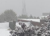 Masts of the USS Constitution in the snow