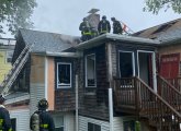 Firefighters at Adams Street fire