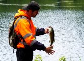 Jamaica Pond fisherman and fish