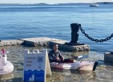 Guy in kayak on Long Wharf