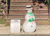 Snowman figure and an air conditioner