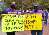 People demanding the end of Haitian deportation from Del Rio