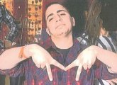 Alleged Mozart gang member Christian Green making his gang sign, from federal affidavit