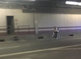 Bicyclist on I-93 north - in the tunnel