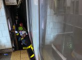 Firefighters at Andrew Red Line stop