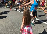 Boston Marathon runners and girl in Ashland