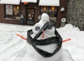 Snowman outside a Brighton Dunkin' Donuts