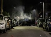 Car smoking after fireworks attack