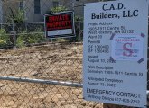 Stop-work order posted outside demolition site