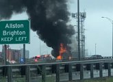 U-Haul truck on fire on the turnpike in Allston