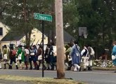 Minutemen and followers marching to Old North Bridge in Concord