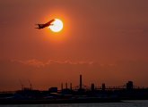 Lazy, hazy jet takeoff from Logan