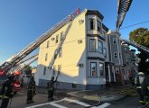 Ladders up at Saratoga Street fire