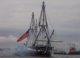 USS Constitution fires cannons to answer salute from Fort Independence