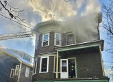 Smoke rising from 51 Beech Glen St.