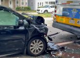 Car after collision with 60 bus