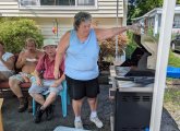 Donna Cabral grilling up some hot dogs