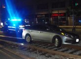 Car on the Green Line tracks at Fuller Street