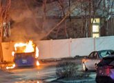 Dumpster on fire in North Cambridge