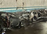 Remains of the three cars in the tunnel