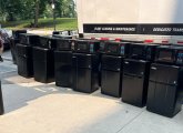 Dorm fridges and microwaves getting unloaded at Emerson