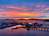 Sunset over Boston and the water from Hull