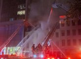 Firefighters attack Jacob Wirth fire from ladders