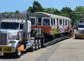 Last two old-school Orange Line cars moving out from Wellington yard