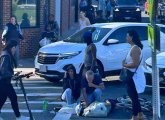 Bystanders attend to downed bicyclist before police, paramedics arrive