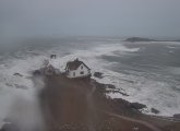 Rough water at Boston Light at the edge of Boston Harbor