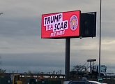 Electronic billboard alerting motorists that Trumb is a scab