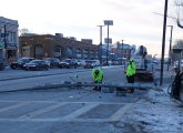 BTD workers begin removing pole, with car that hit it still at the scene