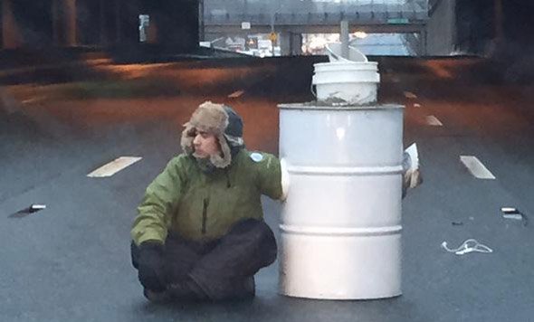 Protester on I-93 in Milton