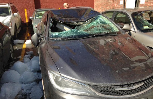 One car destroyed, one damaged by falling ice bombs