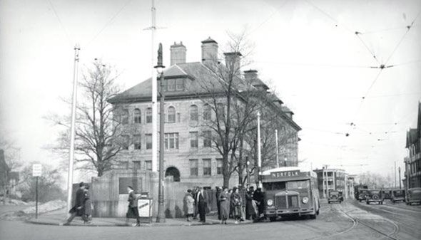 Old school bus at old building in Boston