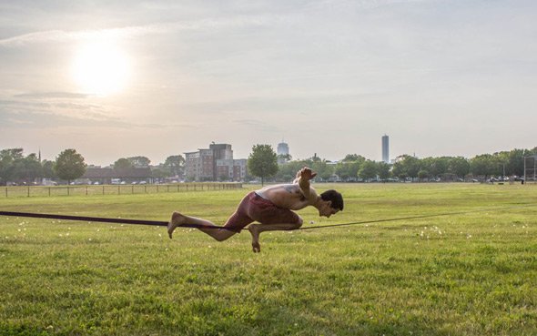 Man on a wire in Moakley Park