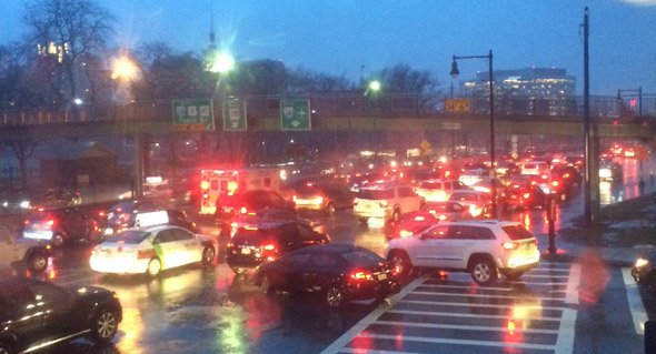 Storrow Drive during a wet rush hour