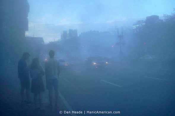 Smoke in front of Faneuil Hall from motorcycles