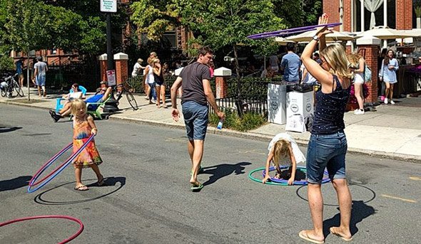 Hula hooping on Newbury Street in the Back Bay