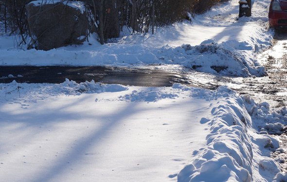 Unshoveled sidewalk outside Spectra Energy site in West Roxbury