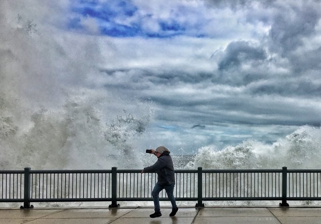 Woman shoots waves on Lynn Shore Drive