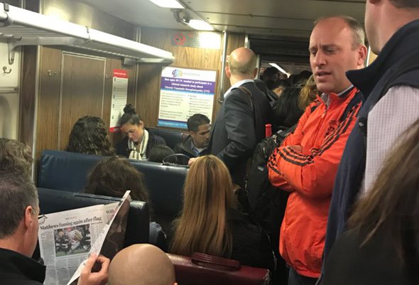 Overcrowded train at Roslindale Village