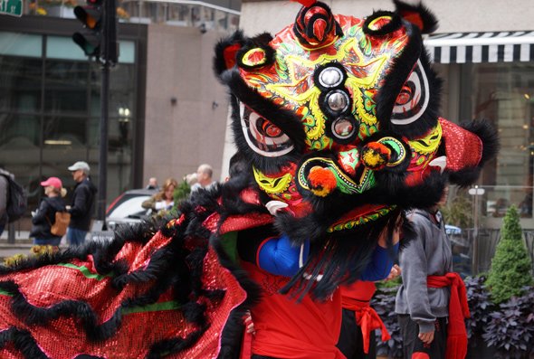 Lion dancer in Double Ten parade