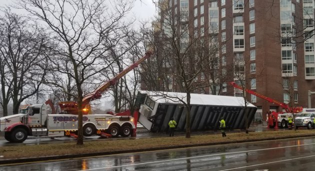 Truck load tipped over by the wind on Land Boulevard