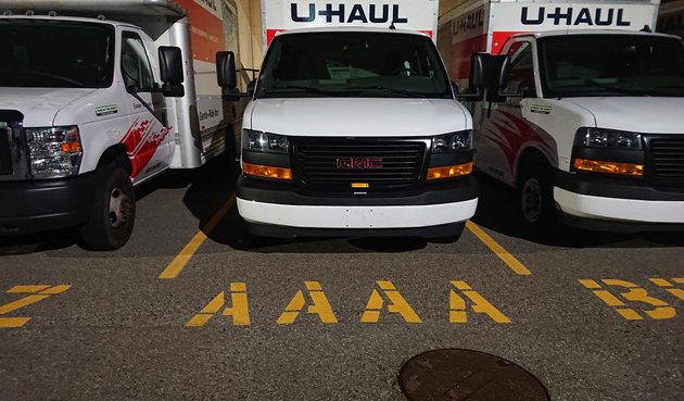 Stacks of U-Haul trucks in Woburn