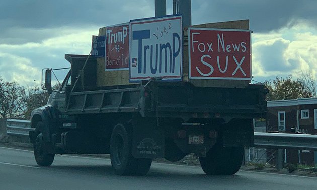 Truck festooned with pro-Trump, anti-Fox signs on I-93