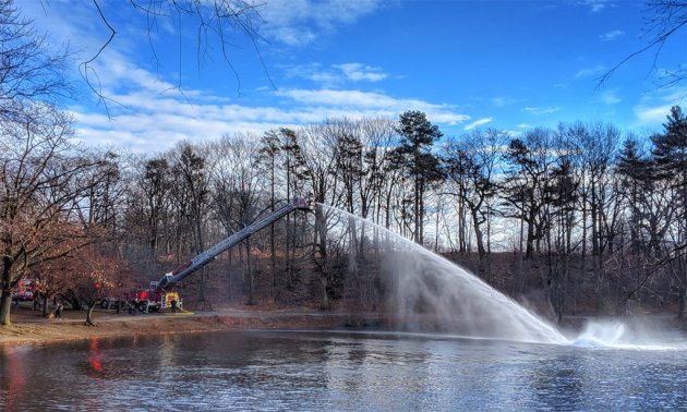 Boston firefighters training at Jamaica Pond