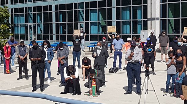 Boston clergy in silent vigil outside police HQ for same number of minutes as George Floyd suffered