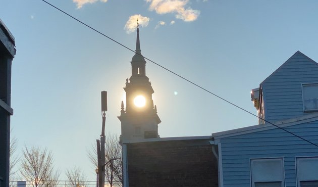 Sun shines through Dorchester Heights Monument this morning